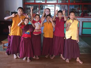With the young monks to whom she taught English
